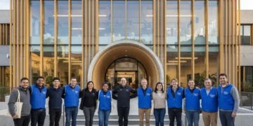 Community center facade with diverse people, symbolizing successful homelessness integration.